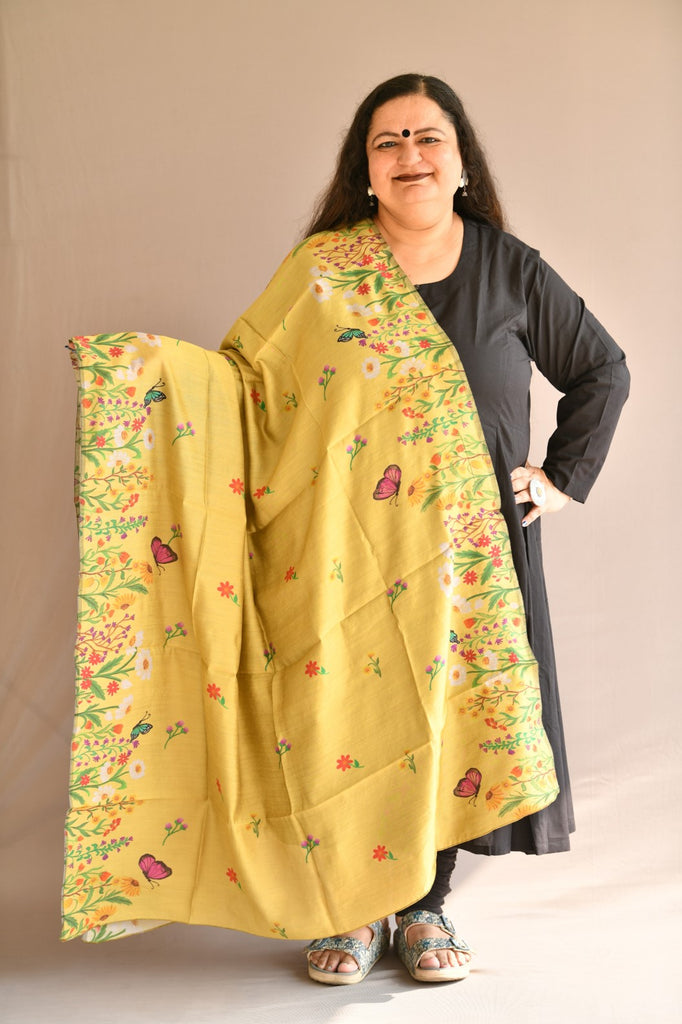 Front pose of model wearing a Gold coloured Chanderi Silk dupatta shawl with beautiful designer hand-painted and printed floral motifs, meadows and butterflies.